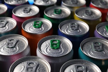 Many aluminium cans of beverage as background, closeup