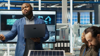 Photovoltaics plant researchers evaluating solar cells to identify weaknesses and improve energy...