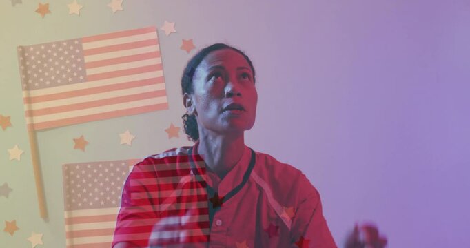 Person wearing sports jersey looking up with American flag animation overlay