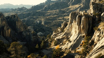 A breathtaking view of a rugged mountainous landscape featuring towering rock formations and steep cliffs, with patches of greenery interspersed among the rocky terrain. The scene is illuminated by a 