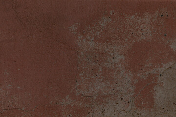 This is a textured dark brown background that features a grunge effect and can be utilized in various designs