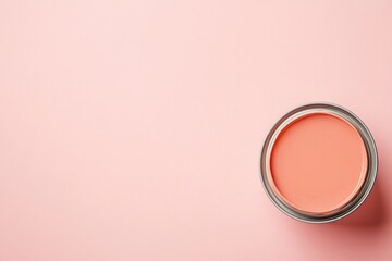Coral paint can on pastel pink background