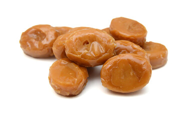 Caramel candies isolated on white background