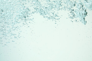 Many water bubbles on light background, closeup. Space for text