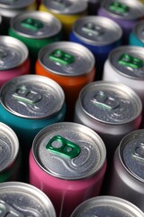 Many aluminium cans of beverage as background, closeup