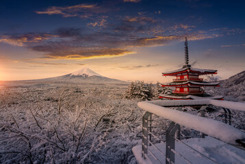 Fujiyoshida, Japan Beautiful view of mountain Fuji and Chureito pagoda at sunrise of Mount Fuji during winter.This is one of the famous spot to take pictures of Mount Fuji.