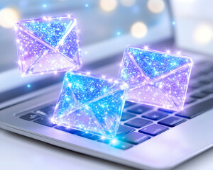 Glowing email icons floating over a laptop keyboard