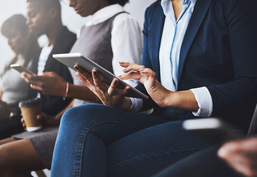 Waiting room, hands and people with tablet, recruitment and review of resume for job opportunity or digital. Business, candidate and group with tech for research, corporate or preparing for interview