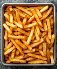Deliciously crispy golden french fries served hot in a bowl capturing the essence of fast food indulgence and comfort