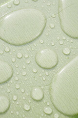 Water droplets on a smooth surface after a gentle rain shower