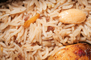 Delicately spiced rice with nuts and meat in a traditional dish