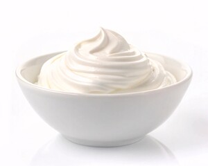 Whipped Cream Elegance: Fluffy Topping in a Ceramic Bowl.
