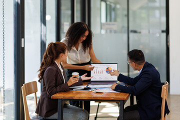 Fototapeta premium Financial Business analyze the graph of the company's performance to create profits and growth, Market research reports and income statistics, Financial and Accounting meeting concept. 