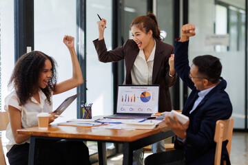 Group of  businesspeople or team creative businesspeople coworker in office Happy to be successful partnership teamwork celebrating achievement and success concept.
