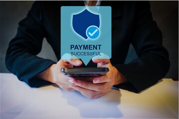 Digital payment confirmation on a smartphone screen with a secure transaction symbol. Represents...