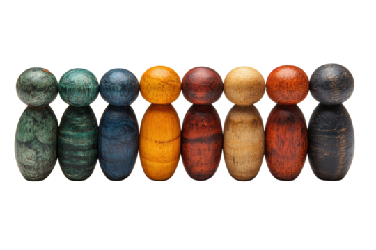 Colorful wooden figures aligned in a row on a white isolated background, perfect for creative displays.