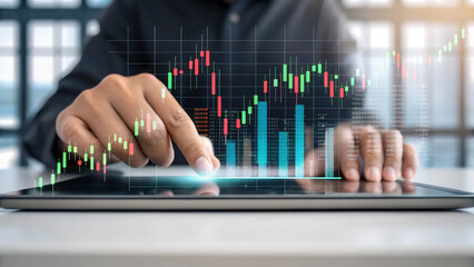 detailed shot of fingers swiping holographic financial graph on tablet, showcasing data analysis and investment trends