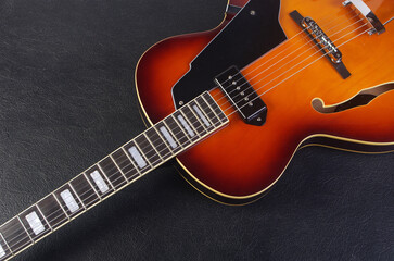 Fototapeta premium Jazz guitar on a dark background.