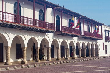 Colonial Architecture with Flags in Cartagena. Bolívar, Colombia, Showcasing Spanish Heritage