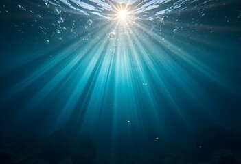 Fototapeta premium Sunlight Beaming Through Tranquil Ocean Waters with Floating Bubbles and Deep Blue Serenity 