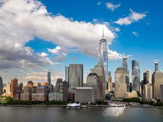 New York City an sky. NYC cityscape with skyscrapers. Aerial view of New York City skyline. Manhattan skyline. New York and Hudson River. Downtown NYC. New York skyscrapers from top.