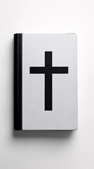Fototapeta premium Bible with Black Cross on White Background Religious Book Still Life