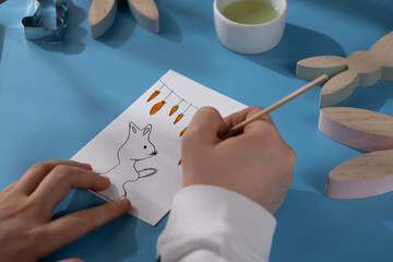 Drawing Easter rabbit bunny Storytelling of creating craft Easter greeting card holiday present....