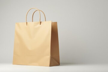 Brown paper shopping bag, handles, folds, clean background, blank, recyclable, background