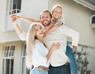 Parents, girl and outdoor by home on piggyback with smile for new house on portrait in England....