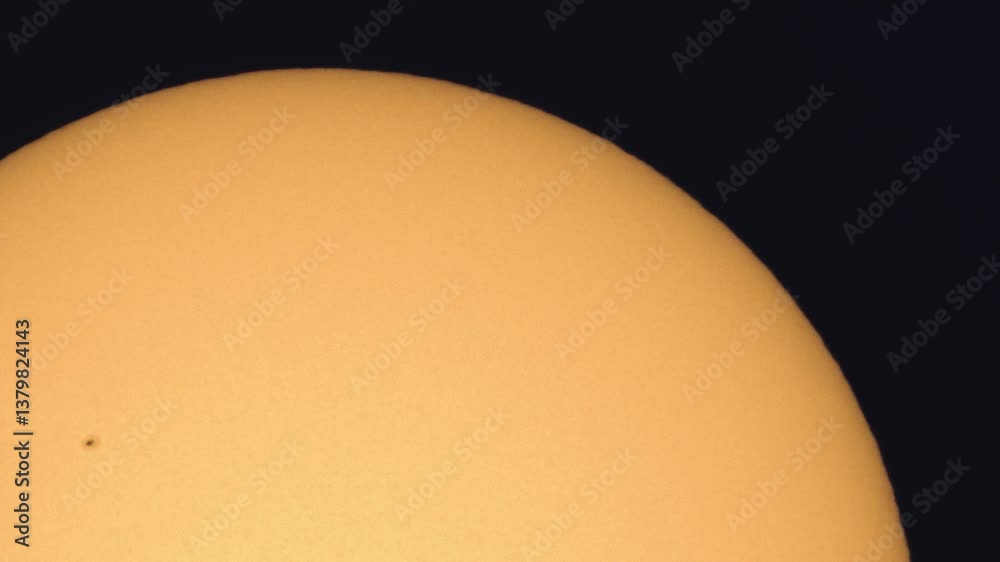 Sticker surface of the sun through telescope with visible sunspots and surface texture and atmosphere turbul