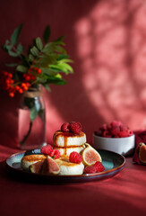 Cottage cheese pancakes with fresh raspberries on the table. Wallpaper, painting, desktop wallpaper.
