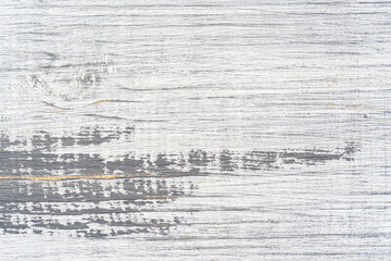 White and gray painted textured wooden plank. Abstract background.