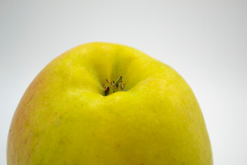 yellow apple on a white background large