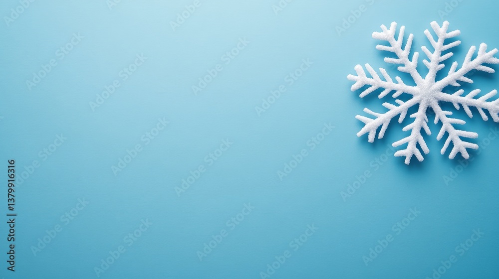 Leinwandbilder Detailed close-up of a white snowflake showcasing its unique patterns against a smooth blue gradient background, providing ample space for design elements