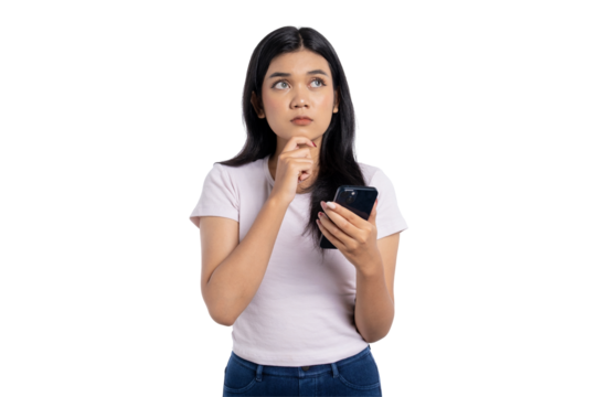 Pensive young Asian woman looking up, holding smartphone and thinking, isolated on transparent background - Powered by Adobe