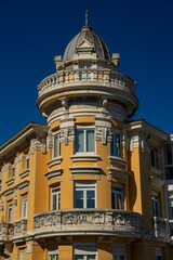 Classical Elegance Amidst a Clear Blue Sky