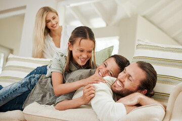 Obraz premium Home, happy kids and family stack with father on sofa for love, care or bonding together in lounge. Smile, children and parents pile on couch with mother, people or siblings play or lying for support