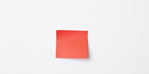 Single red sticky note on white background, close-up view, communication, simple