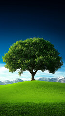 Fototapeta premium Majestic Tree on a Hill: A grand tree stands proudly atop a verdant hill under a deep blue sky. Embracing nature's beauty.