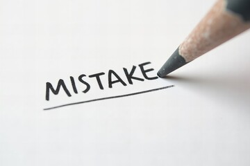 Obraz premium Erasing Mistakes: Detailed Shot of Pencil Eraser Removing Word from Paper, Signifying Writing Correction and Editing