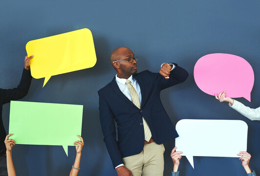Man, check watch and hands for speech bubble in office, impatient professional and waiting for news. Male person, blank poster and people for announcement of promotion, hiring and blue background