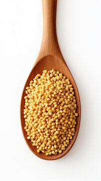 Wooden spoon with millet on a white background