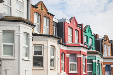 Obraz premium Row of colourful terraced houses around Turnpike Lane in London, UK