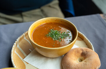 Spicy kharcho or harcho soup, traditional Georgian chowder. Creamy kharcho broth