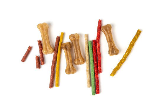 Rawhide chew sticks for dogs, colorful collagen dog food, pressed dry kibble, dental care treats