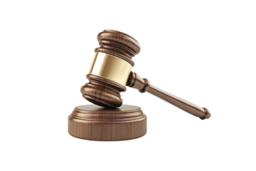 A wooden gavel rests on its circular base, symbolizing justice and authority in a courtroom setting
