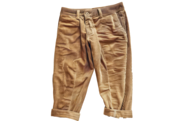 Stylish corduroy pants displayed artistically on a simple white background for fashion enthusiasts