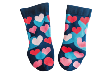 Colorful heart-patterned socks displayed against a light background capturing playful style