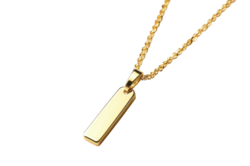 Elegant gold pendant necklace resting on a soft white surface capturing light and beauty