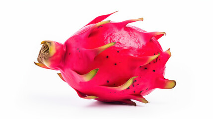 Vibrant pink dragon fruit with greenish-yellow spines is isolated against a clean white backdrop highlighting its unusual shape and colors. This tropical fruit is visually striking and intriguing
